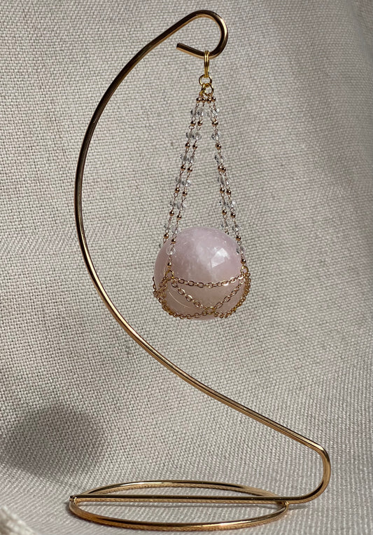 Rose Quartz Crystal Sphere On Luxury Metal Stand