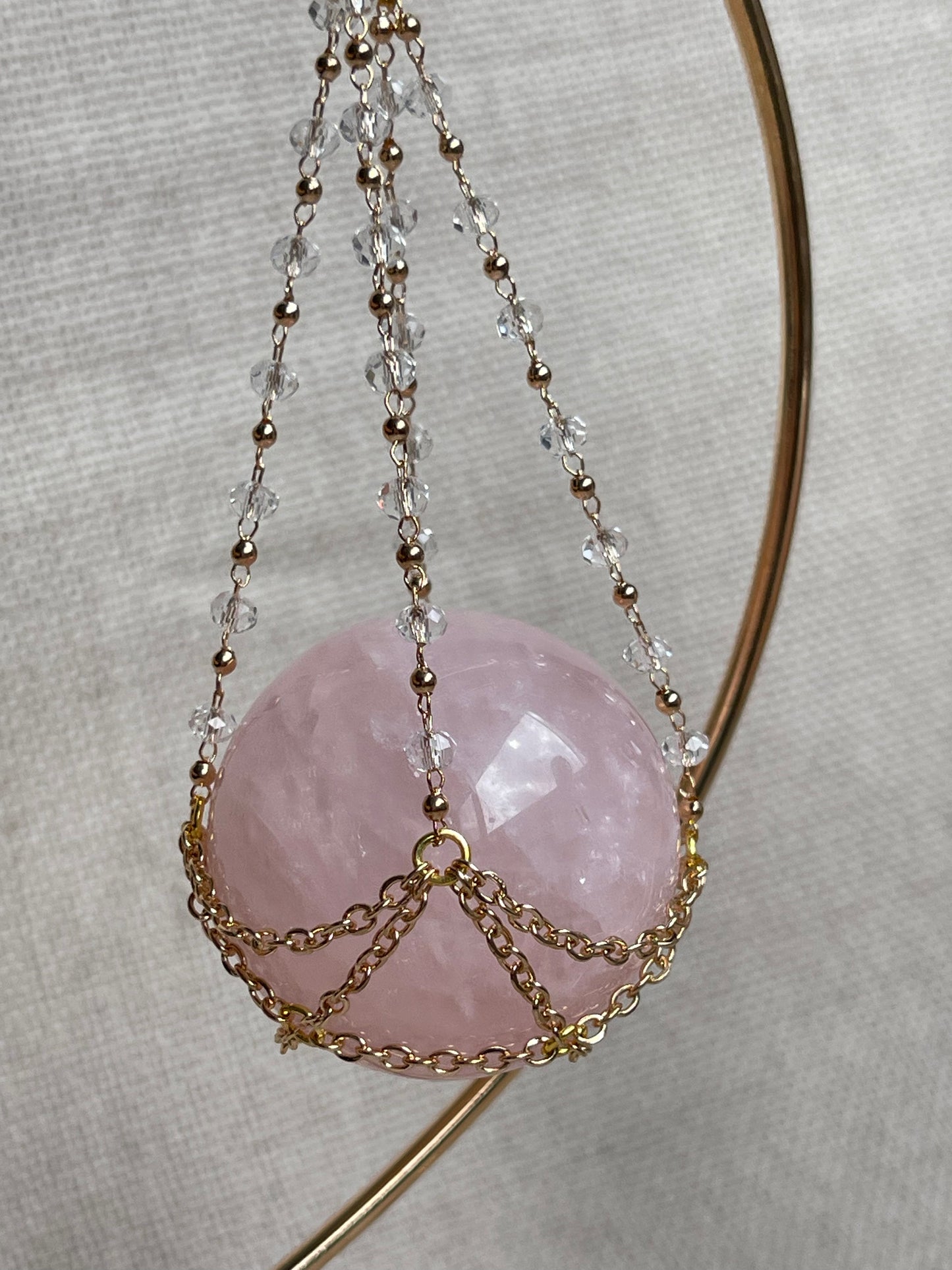 Rose Quartz Crystal Sphere On Luxury Metal Stand